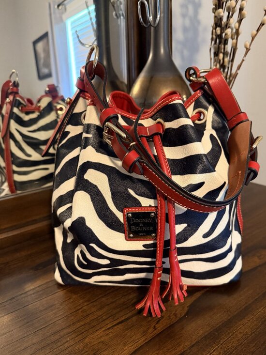 Dooney & Bourke Handbags - Dooney & Bourke Tasha Zebra Drawstring Bucket Bag, NWOT